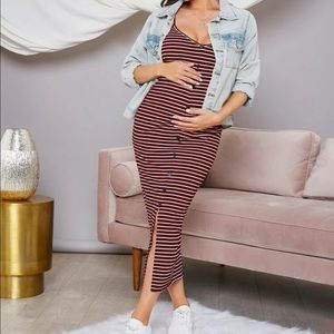 It’s a burgundy with white stripes with spaghetti straps.